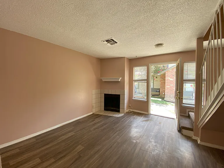 Fireplace, living room and stairs