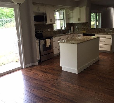 Custom kitchen, with granite counters and stainless steel ap