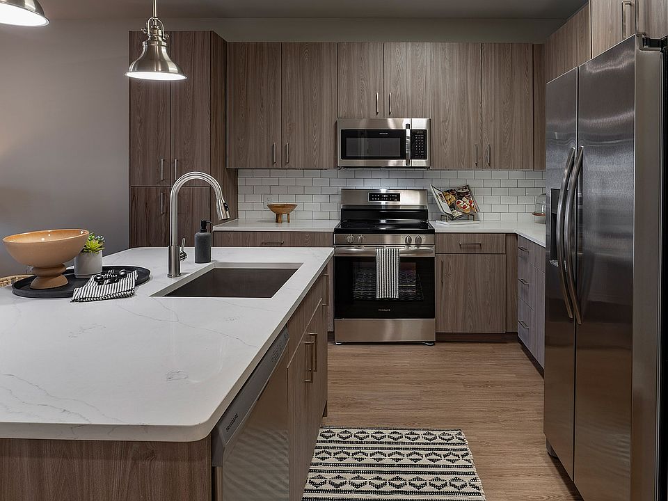 Elevate your culinary experience in this sleek, modern kitchen designed for both style and functionality.