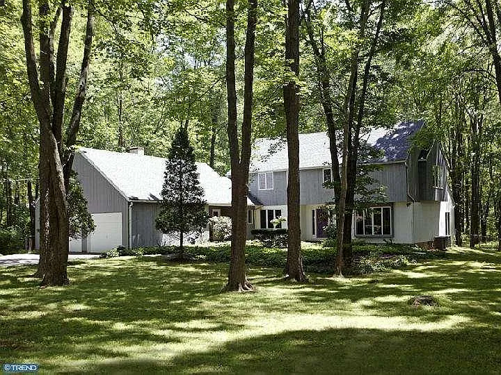 View of front of the house from Carson Road. Carson Woods is directly across the street