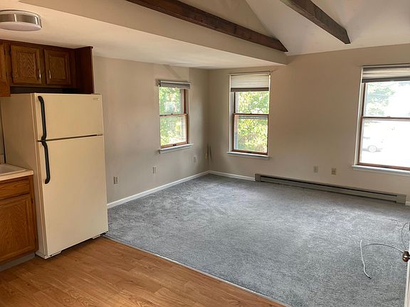 This white refrigerator is no longer in the apartment. The unit now features a stainless steel refrigerator as shown in previous photo.