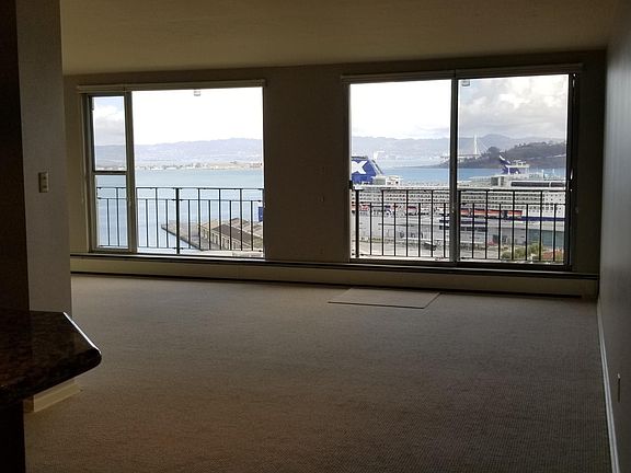 Open Floor Plan, Large windows and patio slider for easy access to your private balcony.