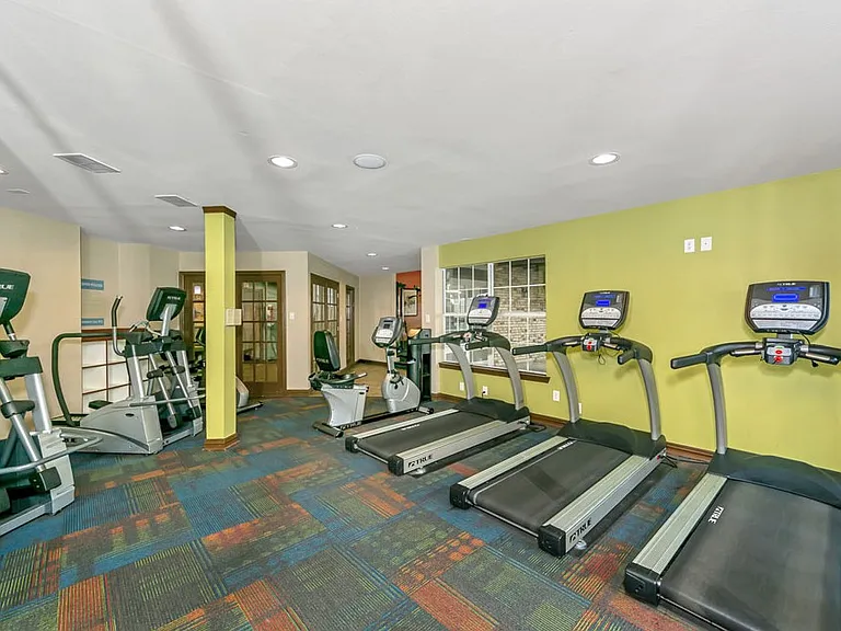 Fitness center with treadmills and cardio machines
