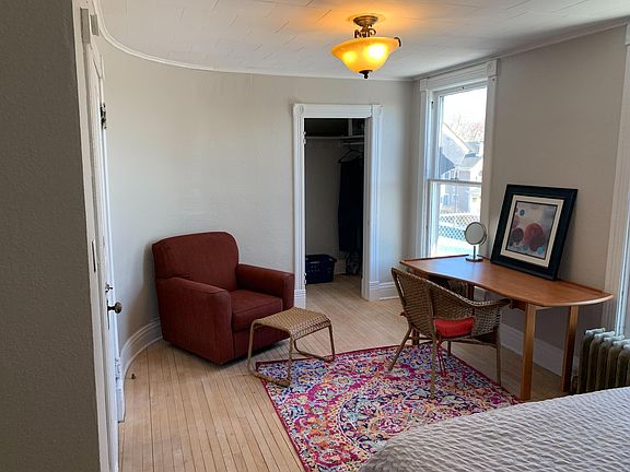 1st bedroom on the 2nd floor w/fireplace, TV, and 2 windows that have views of Lake Superior - another view of the same room