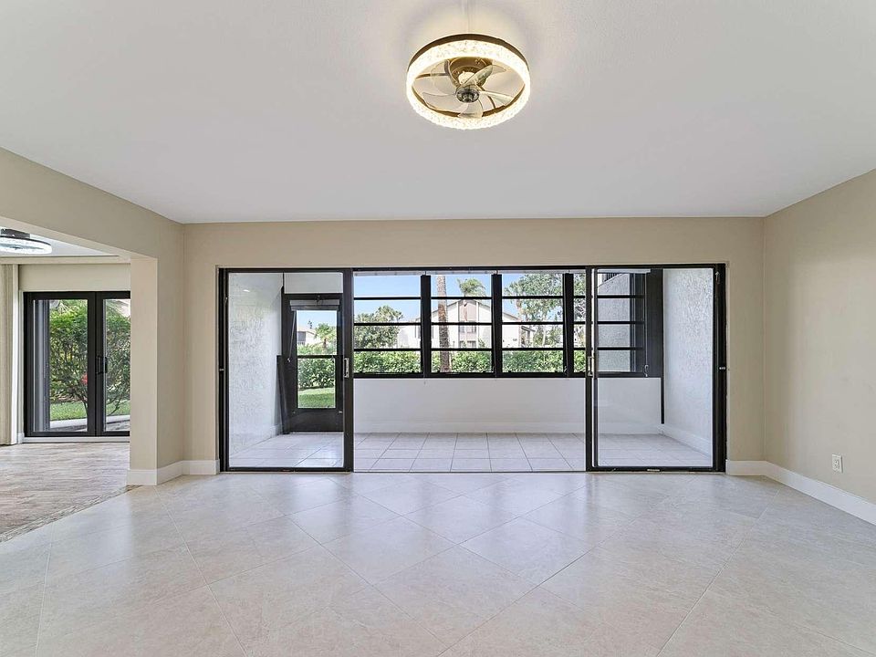 Pristine Living Top to Bottom: Fresh Porcelain Floors and Updated Ceilings Throughout
