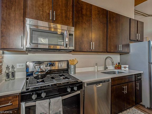 Stainless steel appliances with a built in microwave
