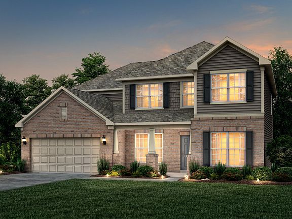 Wingate Exterior 8 features Brick, Hardie Board siding, shakes, covered front proch and 2 car garage