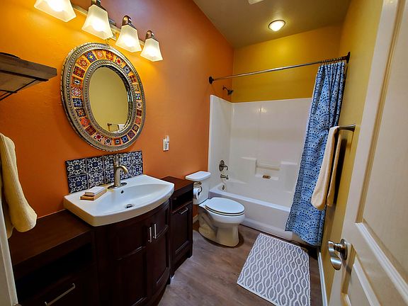 Main bathroom with shower and tub.