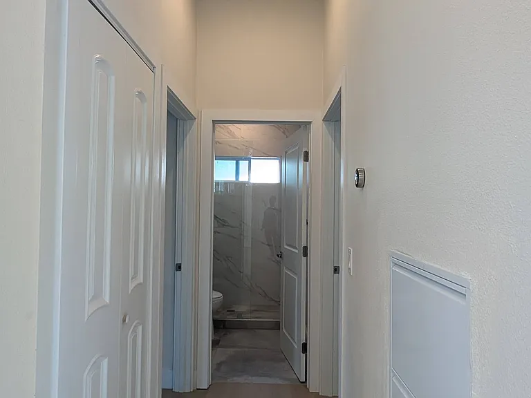 Hallway with in-wall Shoe rack