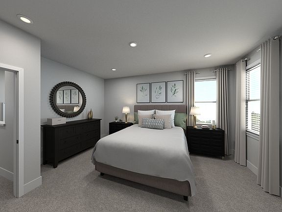 The primary suite offers a private retreat.