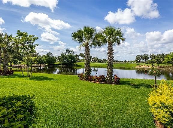 The back yard faces west and enjoys a water view