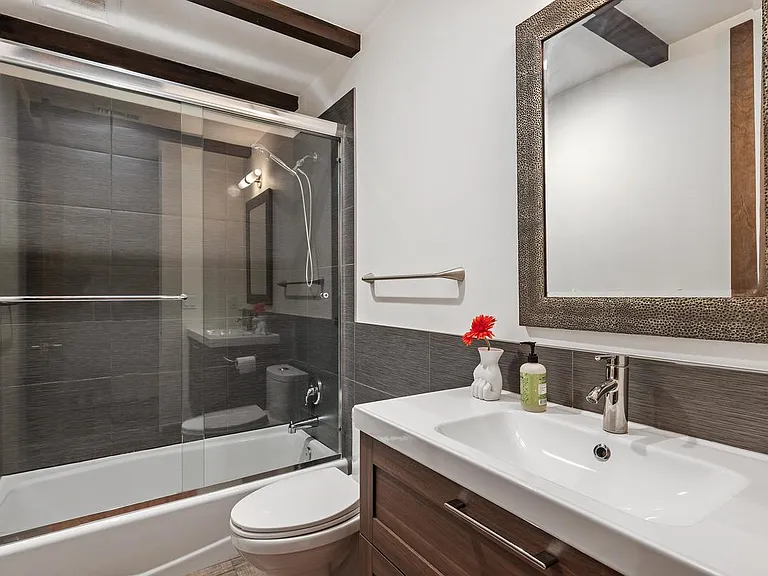 Bathroom off expansive living room