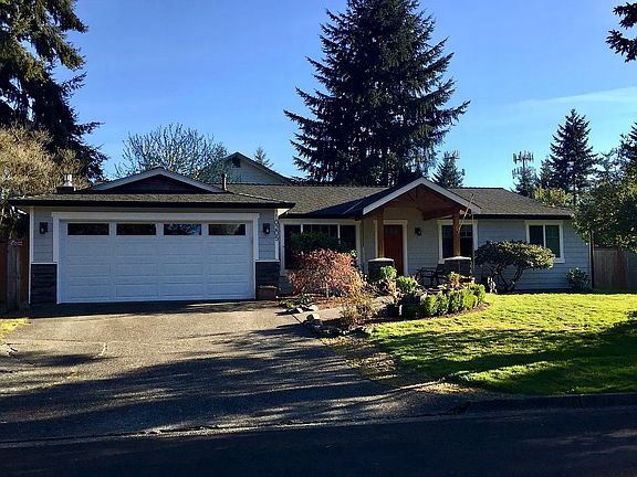 3BR+Den, 1.75BA house located on quiet street.

*older photo showing green grass