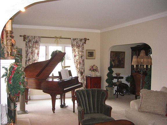 Living Room - arched entrance and fireplace