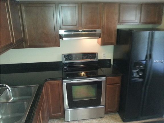 4th image of 5024 Terrace Palms Cir Unit 202