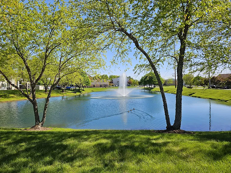 Peaceful pond with fountain viewsan ideal spot to relax and enjoy the beauty of Compass Pointe.