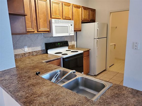 3rd image of 8357 38th Street Cir E Unit 203