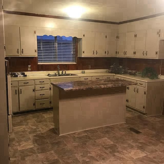 Huge kitchen with eat in island bar