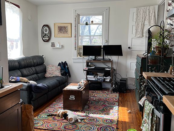 Living area, sunny with great floors