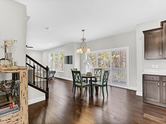 Breakfast room sits between the Kitchen and Great room and has 3 paneled slider leading to the composite deck.