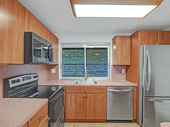 5th image of 9351 Lime Bay Boulevard #201