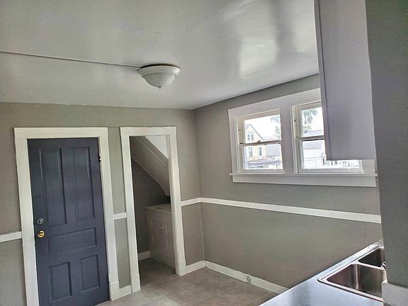 Apt front door; pantry to the right