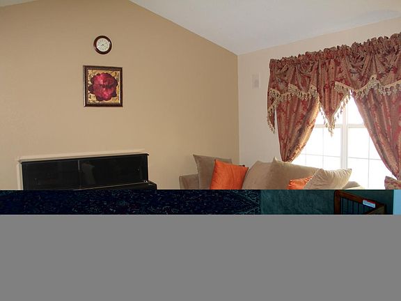 Family room with great natural light and front-facing window