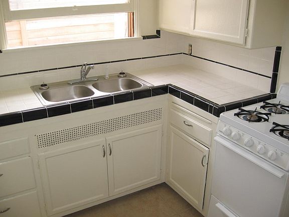 kitchen with gas Stove and Refrigerator