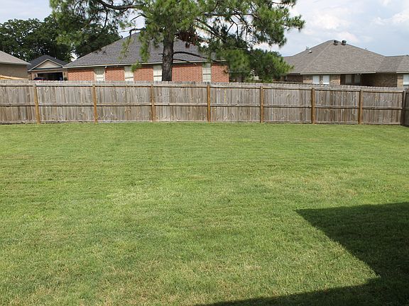 Large, fenced back yard