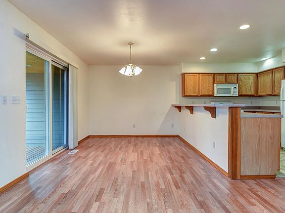 Separate dining area off of the kitchen, large enough for a six-person dining table!