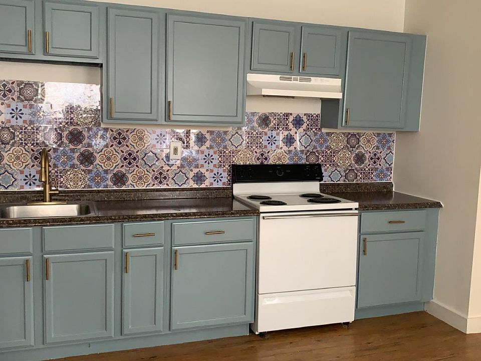 Kitchen area fresh cabinets with brand new hardware and new kitchen faucet