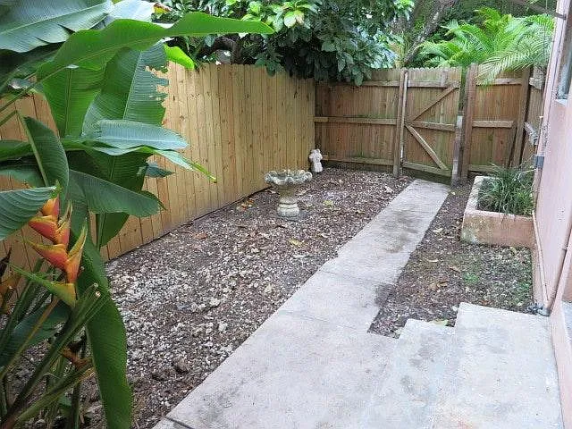 Enclosed Private Patio with Iron Gate
