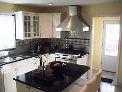 Spacious Kitchen with Center Island and Breakfast Bar
