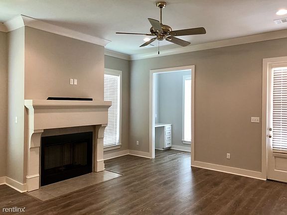 Living room with custom mantle