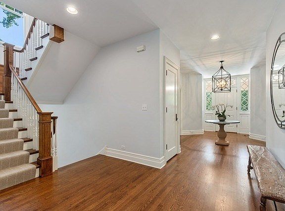 Gracious foyer makes an impression on the quality and design of this home.