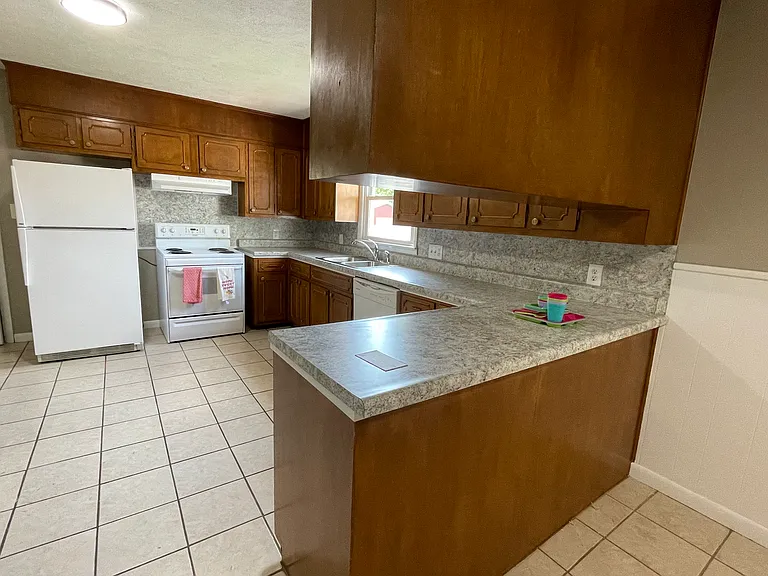 Kitchen updated 2024. New sink, counters, dishwasher, paint and backsplash. New stove in August 2025.