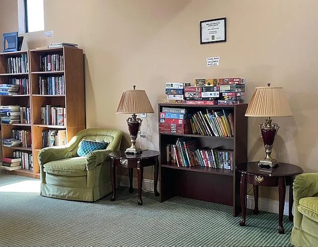 Cozy up with a book at the HOA Club House Library.