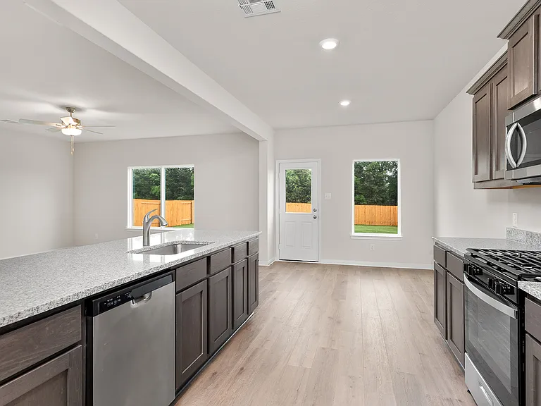 The dining room sits right off of the kitchen.