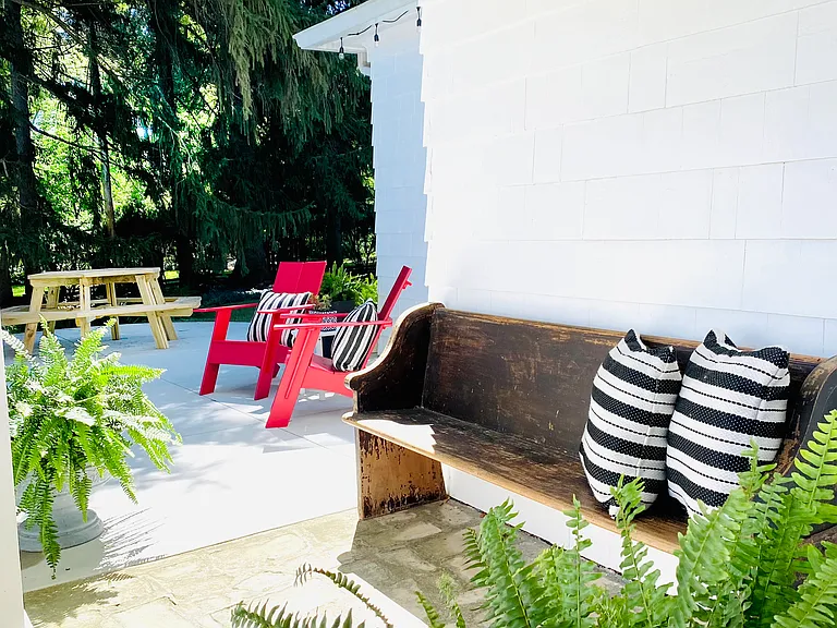 The back patio is just a short walk from the front driveway or accessible through the living room door, providing a seamless transition to your outdoor oasis.