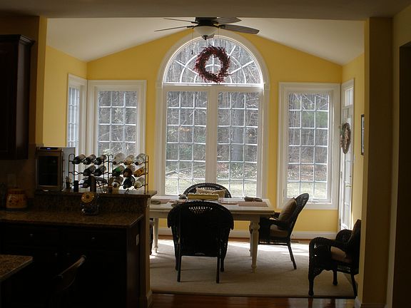 sunroom with hardwood flooring