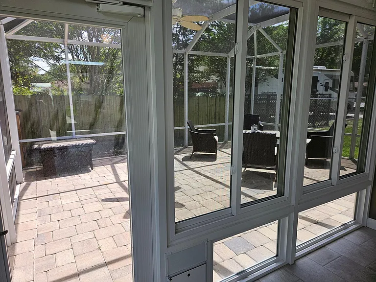 Screened room view from sunroom.
