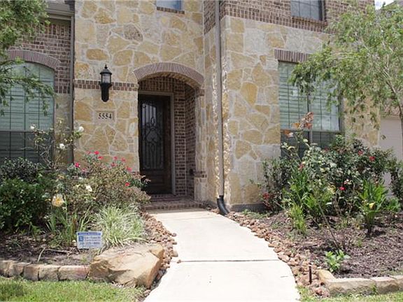 The front door is very pretty, letting in light but not loosing privacy.