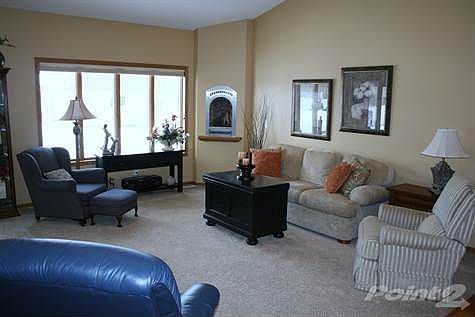 Living room with vaulted ceiling