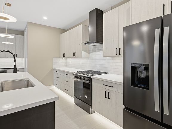 Modern black chrome appliances.