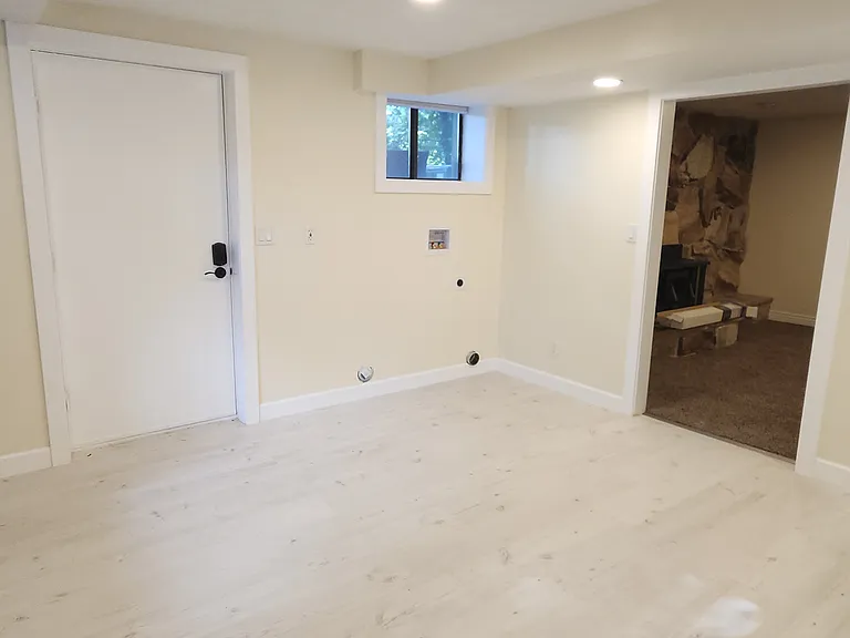 Washer & Dryer hook ups. Shows entrance to living space.