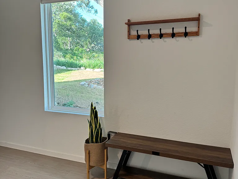 WELCOME! This home is named THE OAK TREE HOUSE after the legacy oak tree visible from the foyer window.