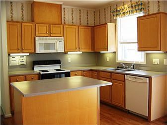 And a center island with bar stool seating