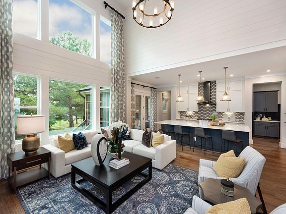 two-story family room with wall of windows