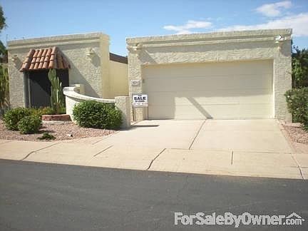 2 car garage with a storage closet and an 80 gallon hot water tank.