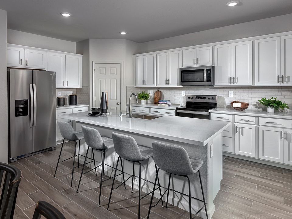 Kitchen in the 4024 floorplan at a Meritage Homes community in Manteca, CA.